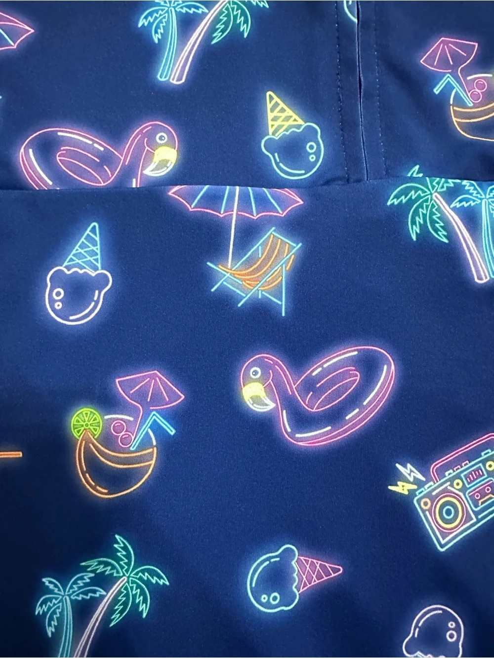 Birdie bound Girls' Navy Neon Print Sleeveless Polo romper